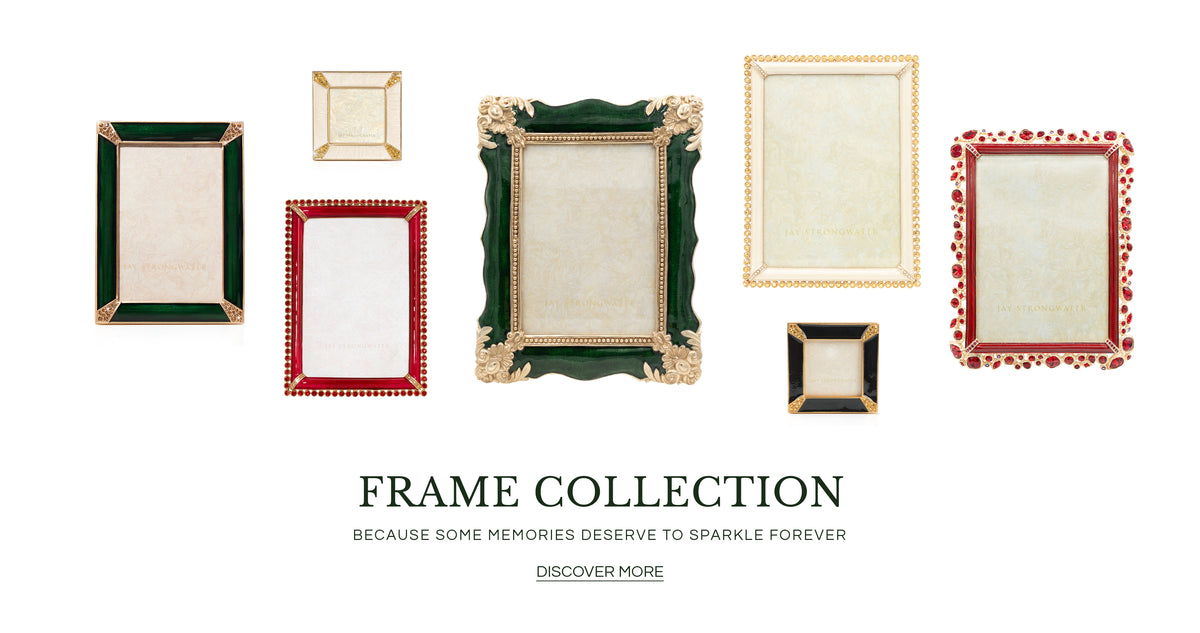 Collection banner featuring Jay Strongwater decorative photo frames in various sizes and colors—including dark green enamel with gold corner details, red crystal-beaded frames, cream enamel with gold trim, and black enamel—with the headline "FRAME COLLECTION" and tagline "BECAUSE SOME MEMORIES DESERVE TO SPARKLE FOREVER"