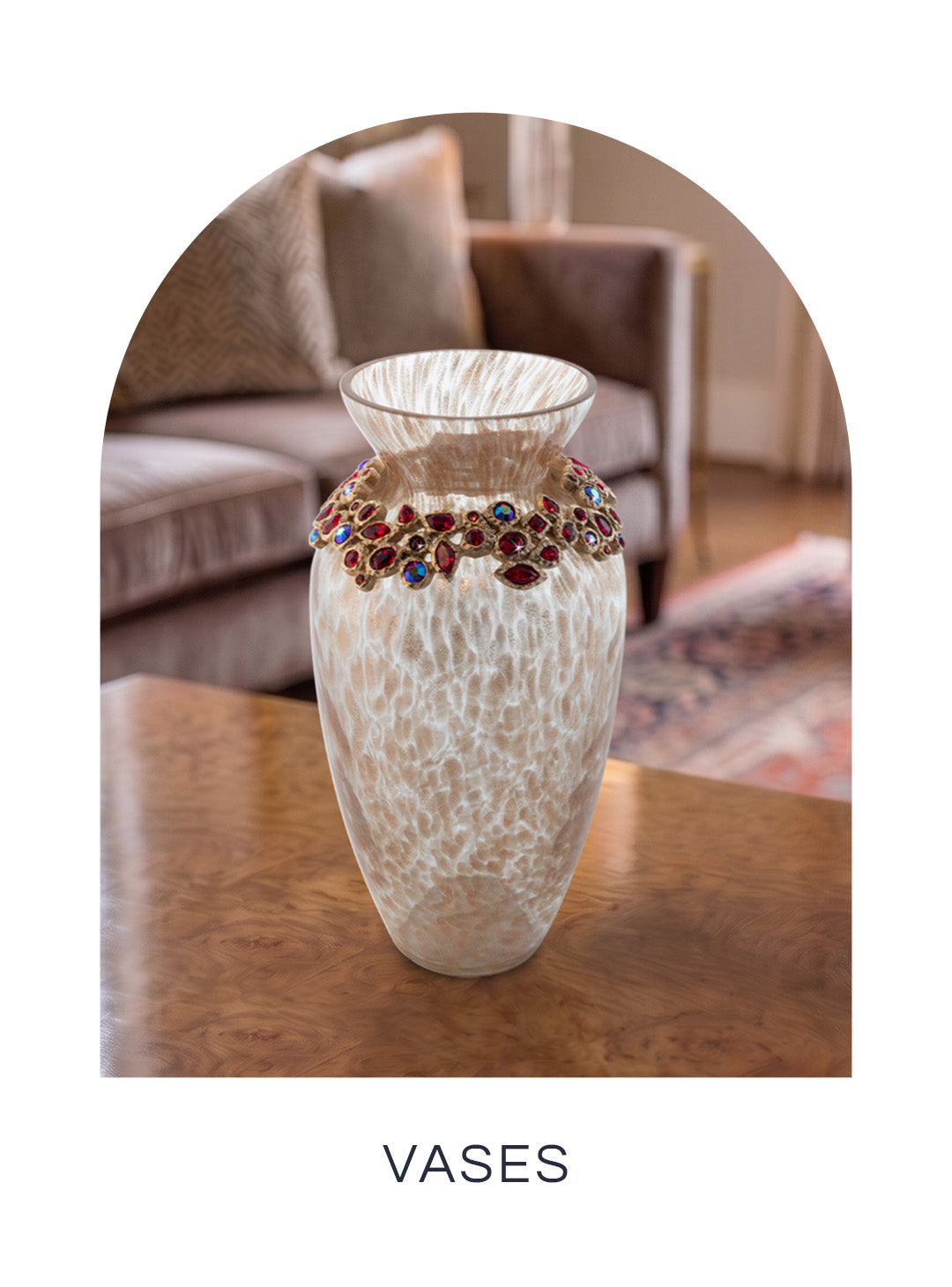 Decorative frosted glass vase with an embellished red jewel collar displayed on a wooden table for the Vases collection.